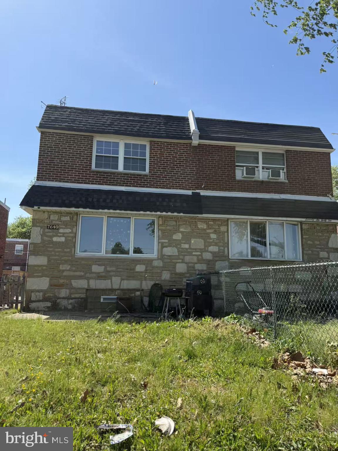 7640 Fairfield Street Philadelphia, PA 19152 - Photo 1 of 24 a front view of a house with a yard