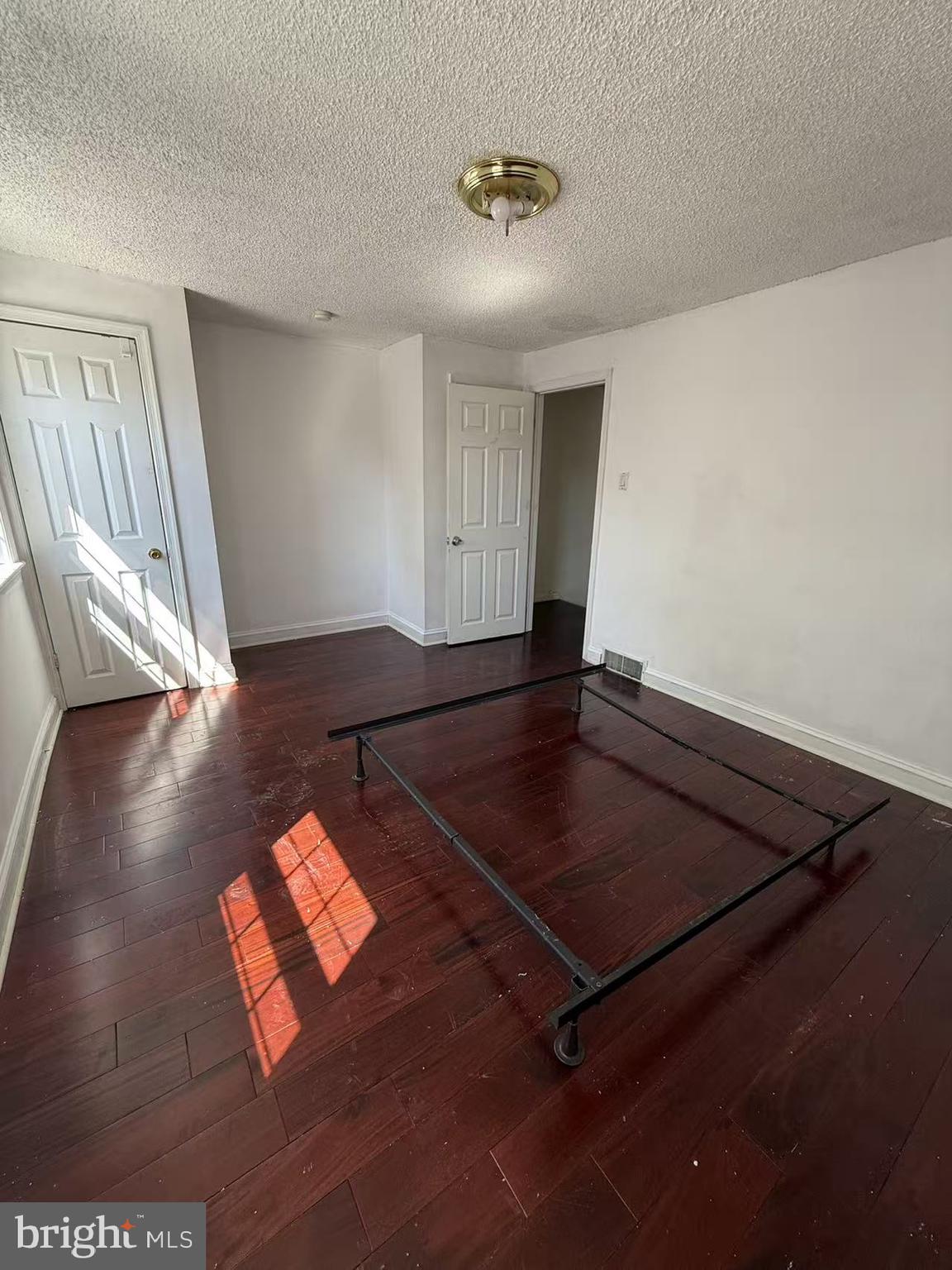 7640 Fairfield Street Philadelphia, PA 19152 - Photo 15 of 24 a living room with hard wood floors and a rug