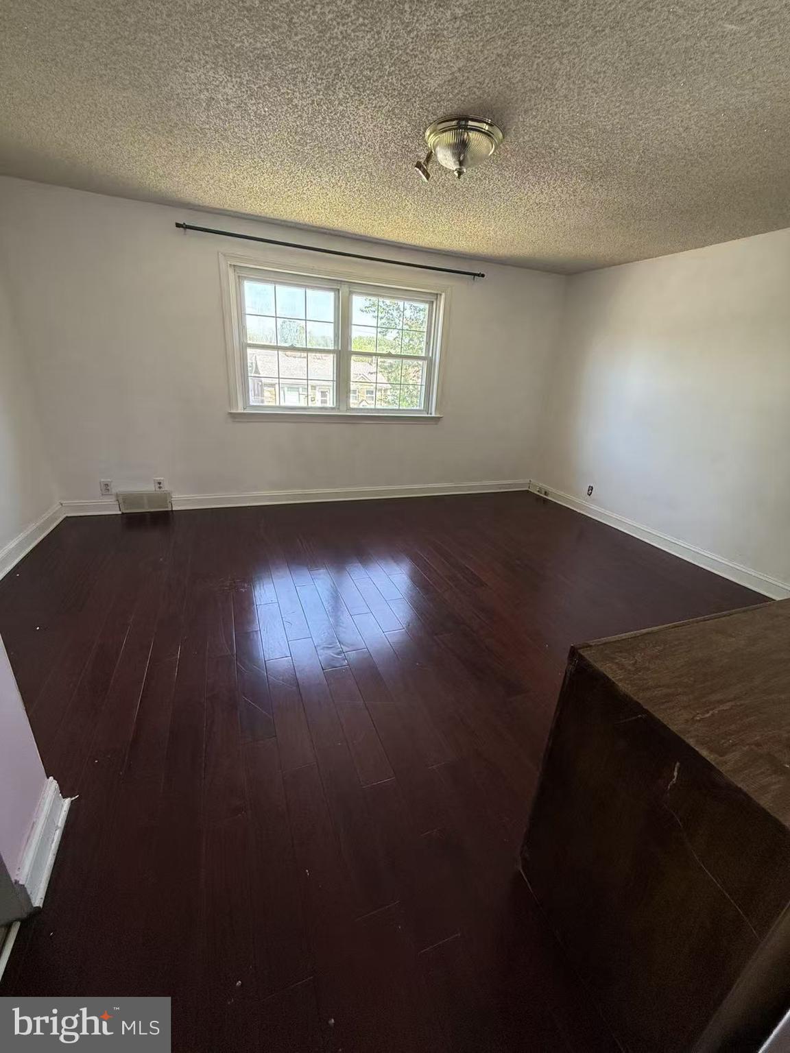 7640 Fairfield Street Philadelphia, PA 19152 - Photo 19 of 24 an empty room with wooden floor and windows
