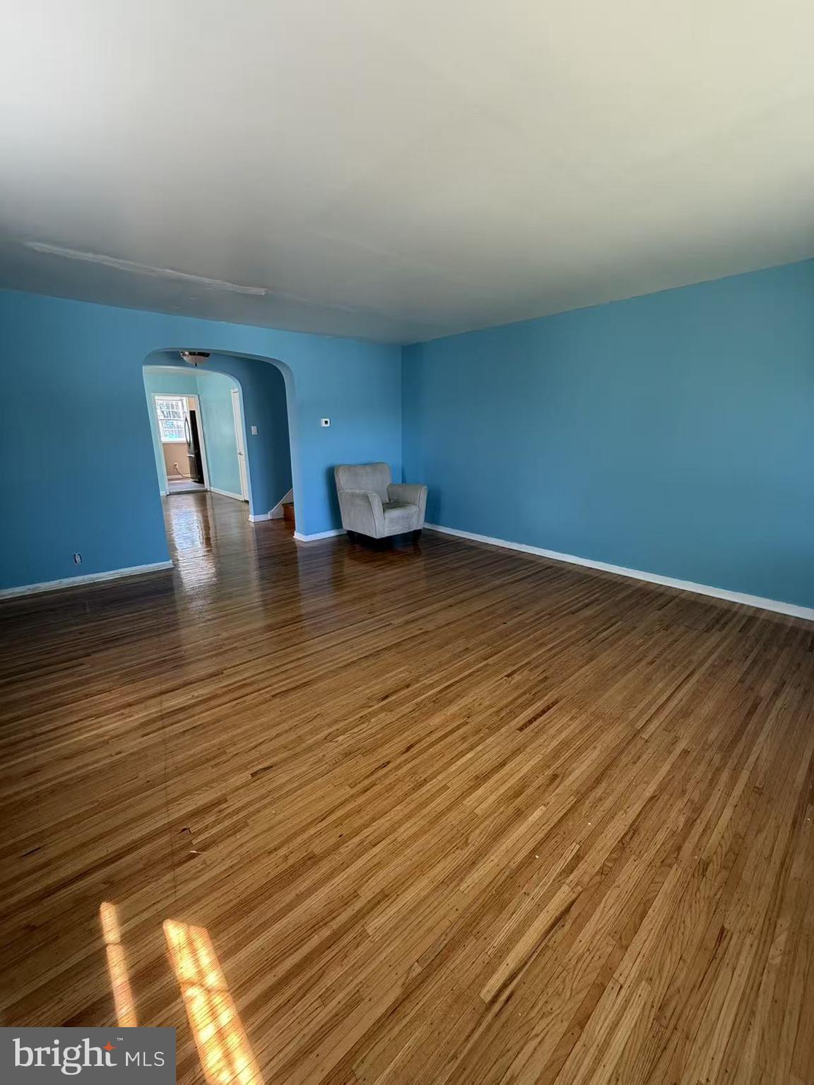 7640 Fairfield Street Philadelphia, PA 19152 - Photo 6 of 24 a view of a room with wooden floor and window