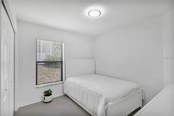 a workspace with furniture and window