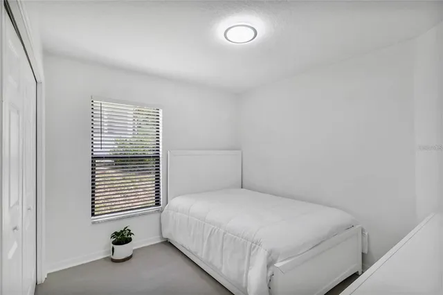 a workspace with furniture and window