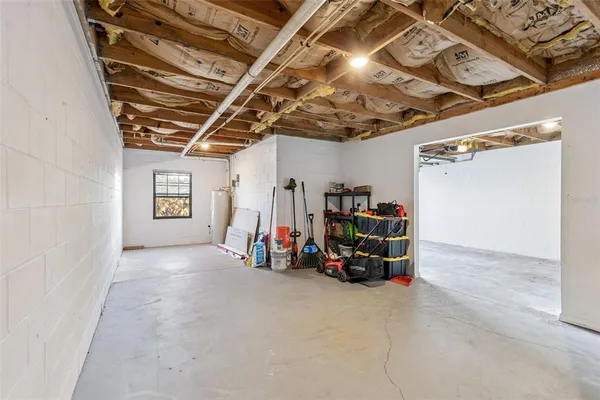 a view of a yard with yellow house