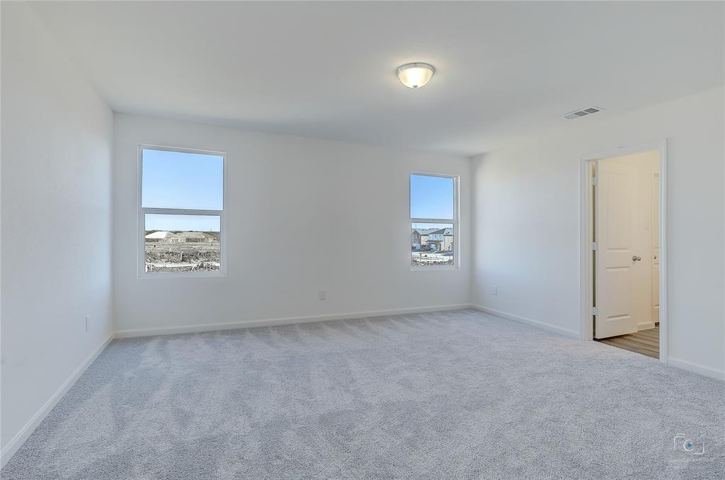 1709 Chapel Hill Road Princeton, TX 75407 - Photo 14 of 25 an empty room with a window