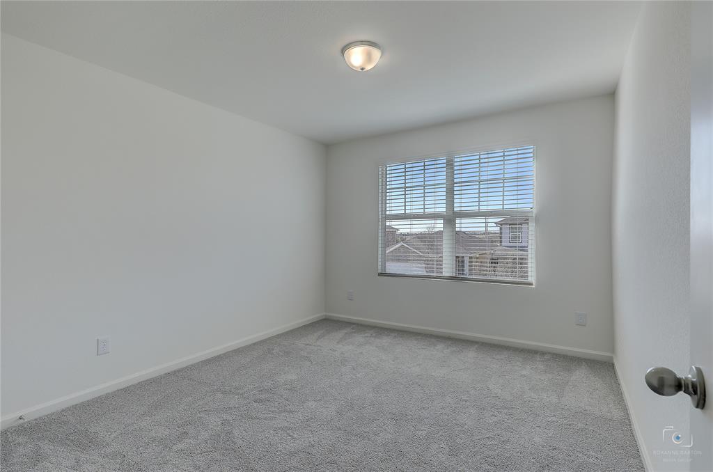 1709 Chapel Hill Road Princeton, TX 75407 - Photo 19 of 25 an empty room with a window
