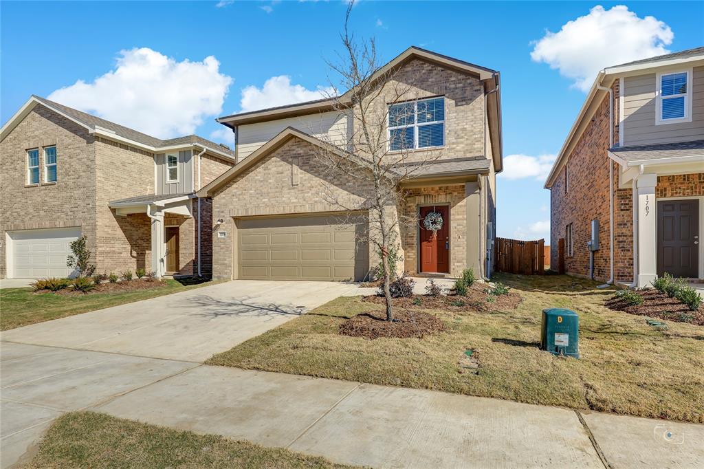 1709 Chapel Hill Road Princeton, TX 75407 - Photo 2 of 25 a front view of a house with a yard