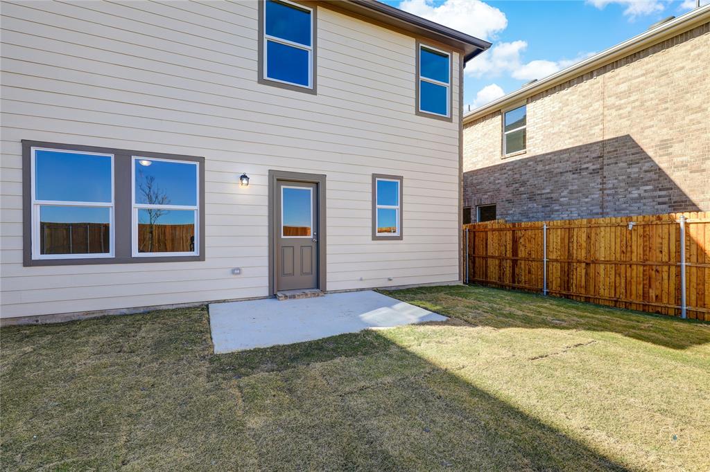 1709 Chapel Hill Road Princeton, TX 75407 - Photo 23 of 25 a view of a house with brick walls