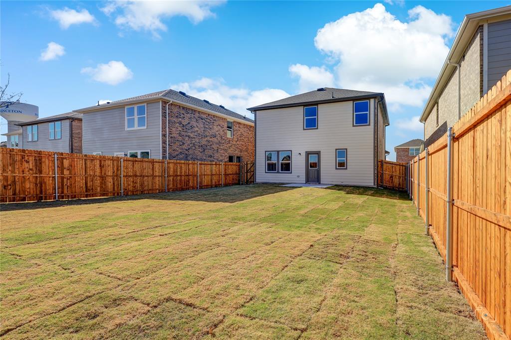 1709 Chapel Hill Road Princeton, TX 75407 - Photo 25 of 25 a front view of a house with a yard