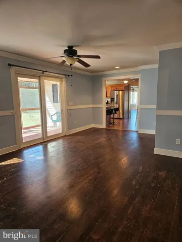 a bath tub sitting in a bathroom next to a window