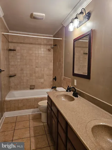 a view of a two chairs on the roof deck