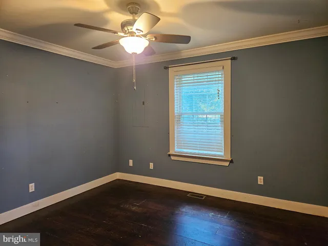 a view of a backyard of the house