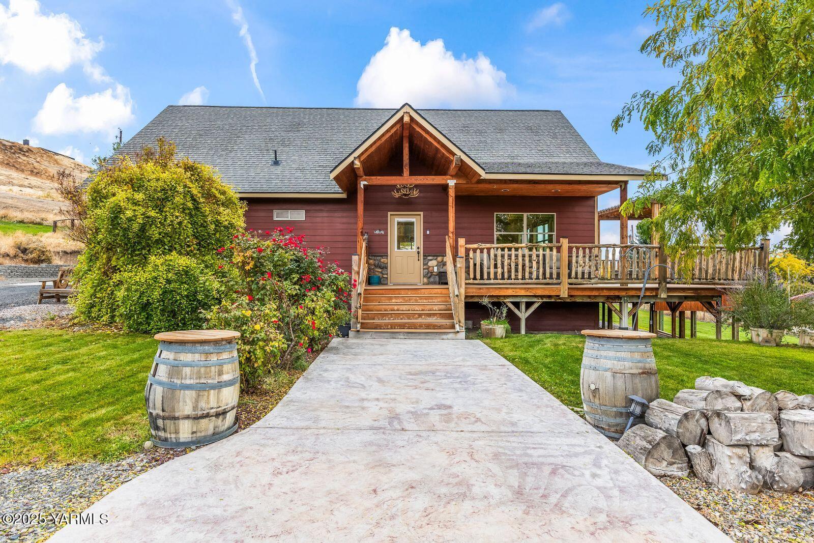 233 Tibbling Road Selah, WA 98942 - Photo 1 of 51 a front view of a house with a yard