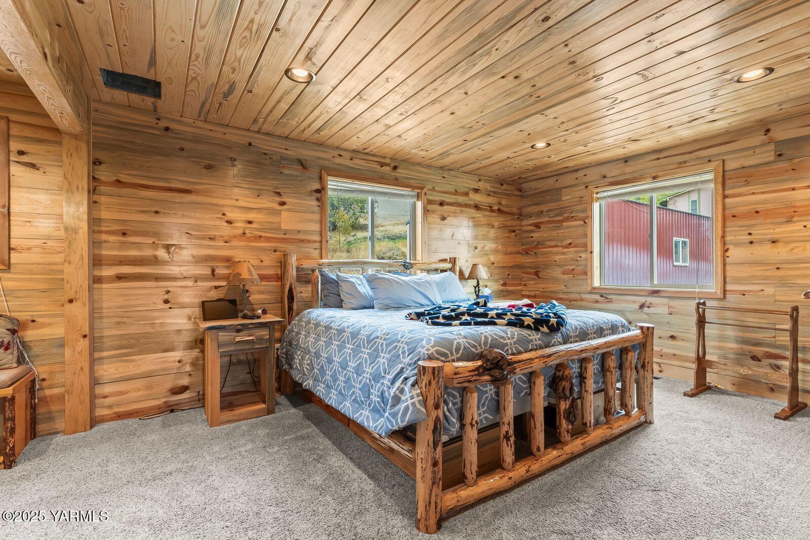 233 Tibbling Road Selah, WA 98942 - Photo 12 of 51 a bedroom with bed and window