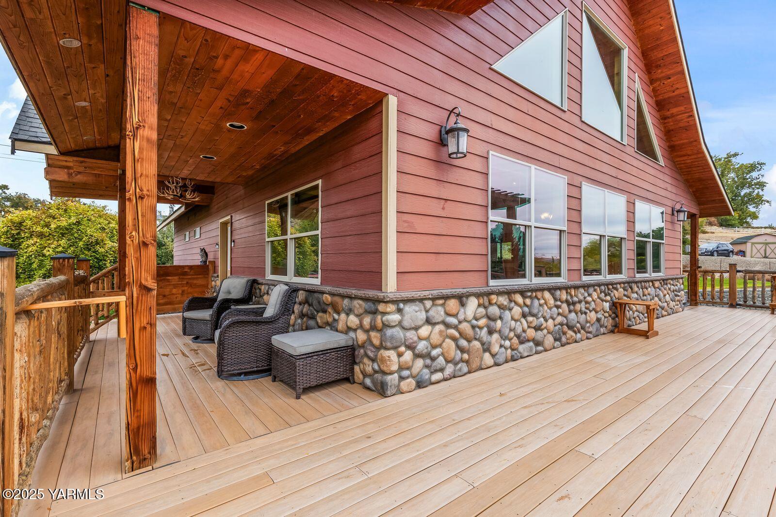 233 Tibbling Road Selah, WA 98942 - Photo 5 of 51 a view of a two chairs and table on the wooden floor