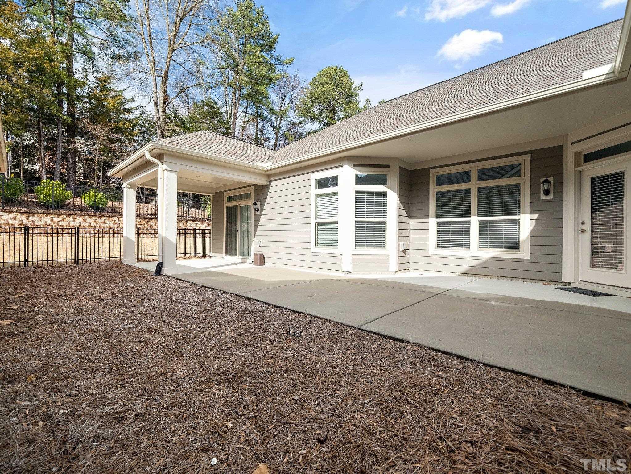 1209 Provision Place Wake Forest, NC 27587 - Photo 18 of 22 front view of a house with a large window