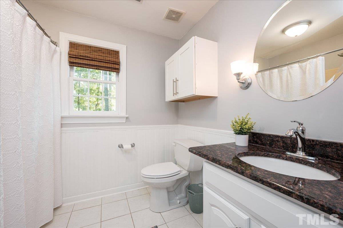 7104 Sandringham Drive Raleigh, NC 27613 - Photo 19 of 25