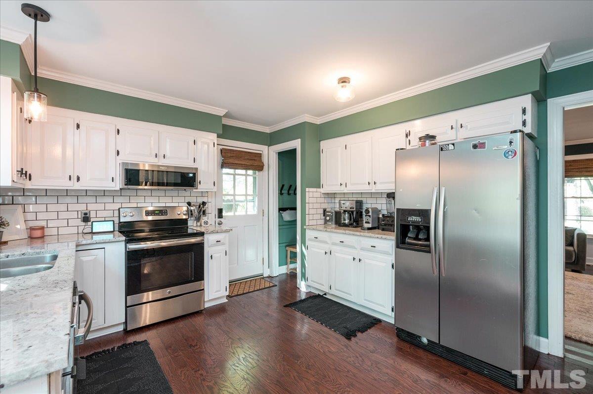 7104 Sandringham Drive Raleigh, NC 27613 - Photo 9 of 25
