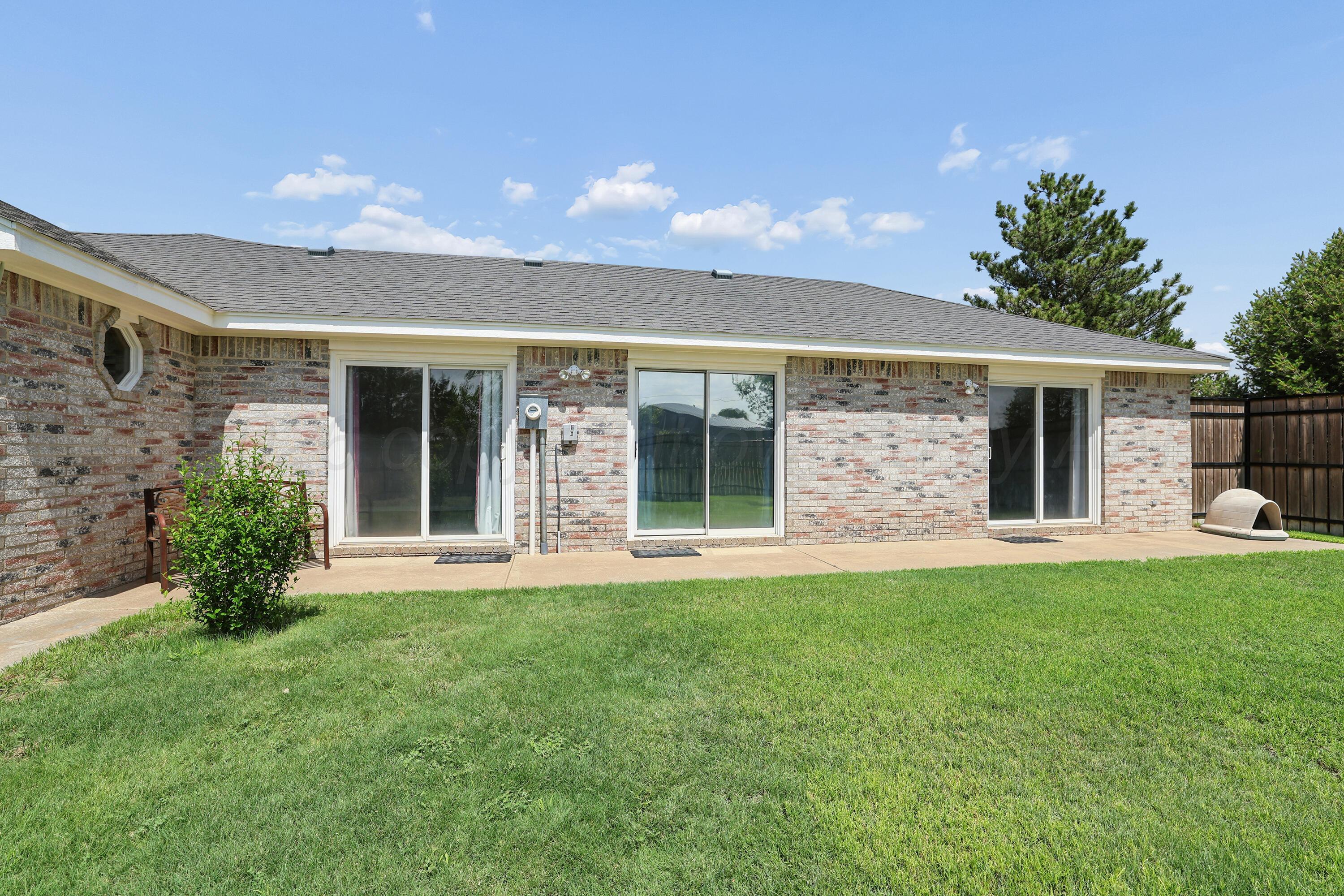 5621 White Fence Road Canyon, TX 79015 - Photo 38 of 56 38-Fenced Yard Back Patio
