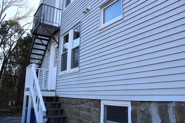 a front view of a house with a garage