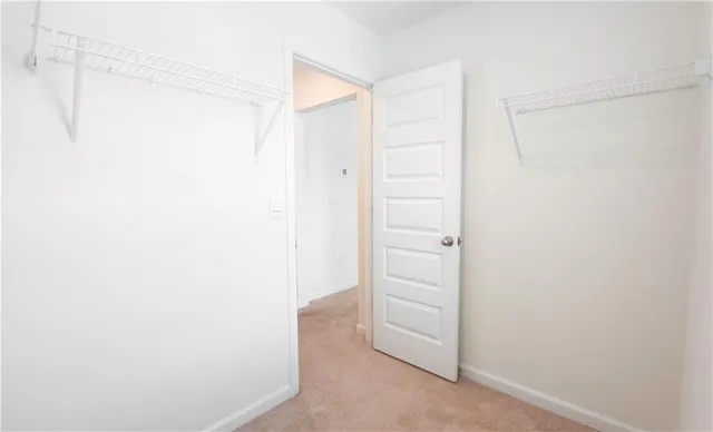 a small space with a shower and a window