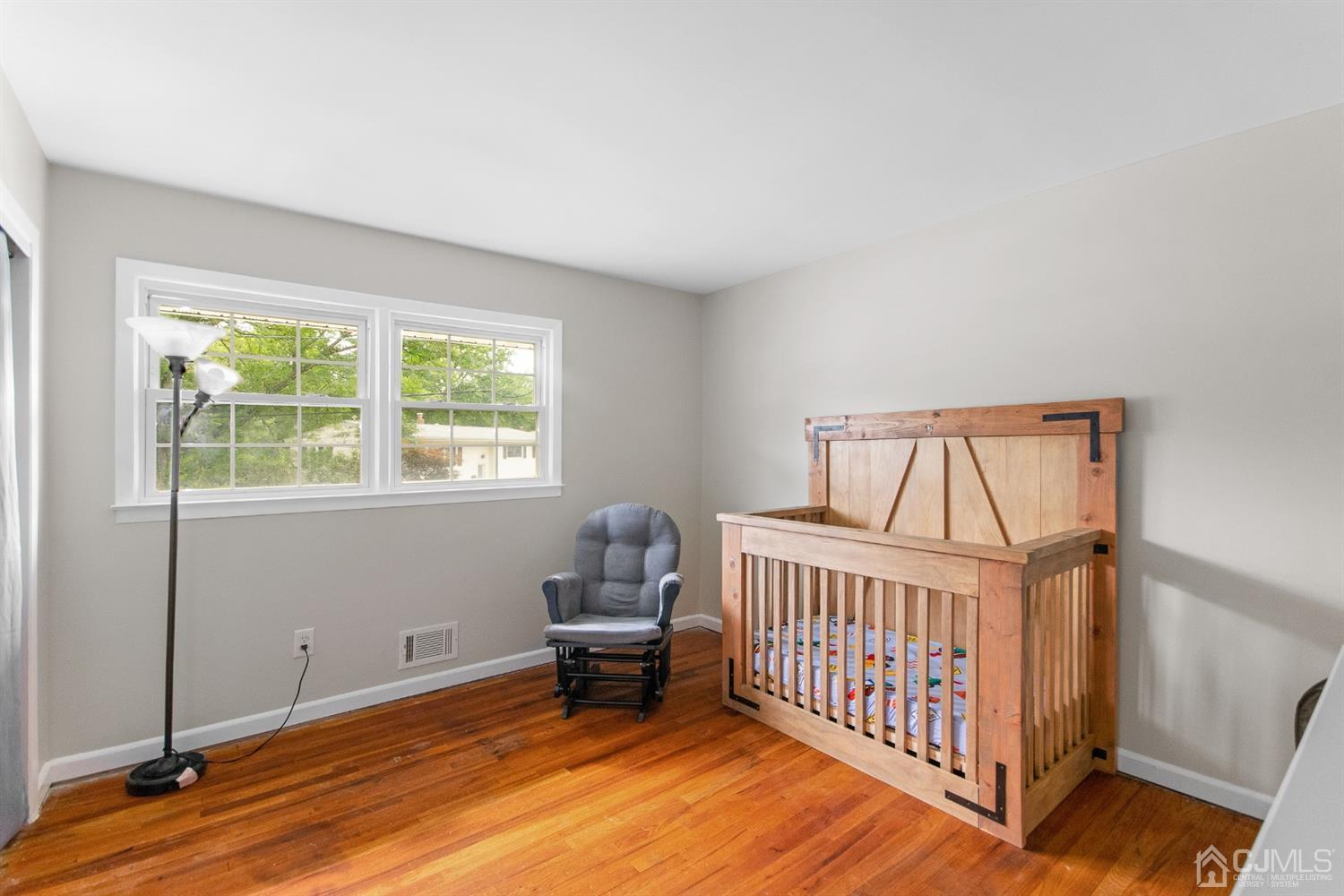30 Wilk Road Edison, NJ 08837 - Photo 19 of 35 a view of a bedroom with furniture and window