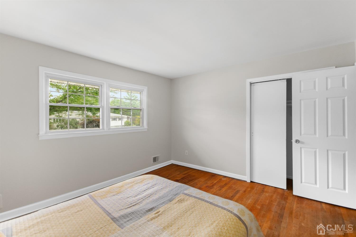 30 Wilk Road Edison, NJ 08837 - Photo 21 of 35 a bedroom with a bed and a window