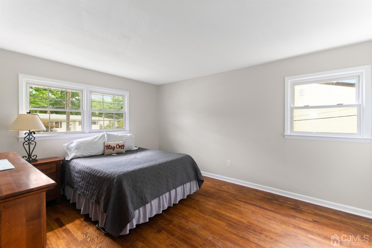 30 Wilk Road Edison, NJ 08837 - Photo 22 of 35 a bedroom with a bed and wooden floor
