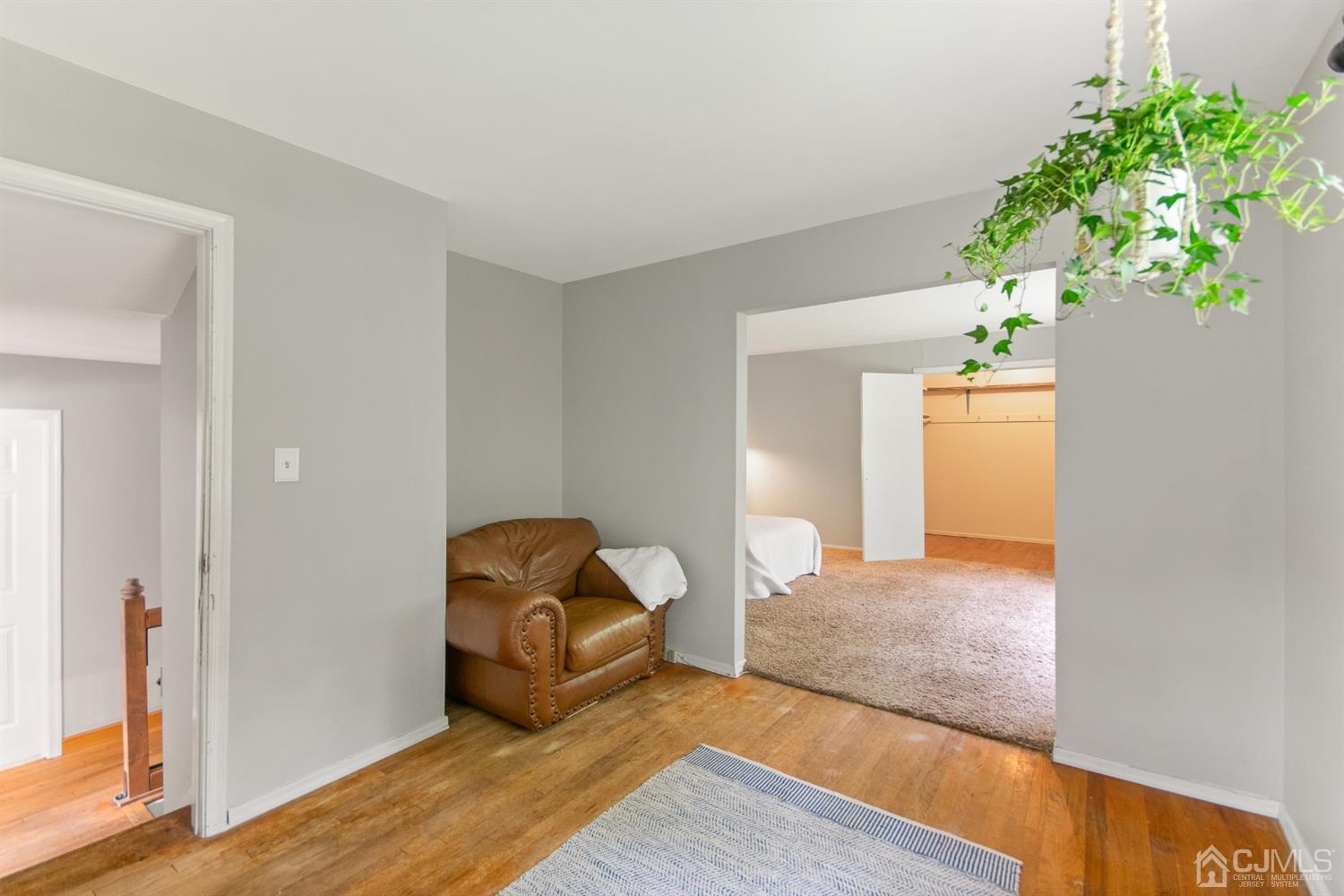 30 Wilk Road Edison, NJ 08837 - Photo 25 of 35 a bedroom with a bed and a potted plant