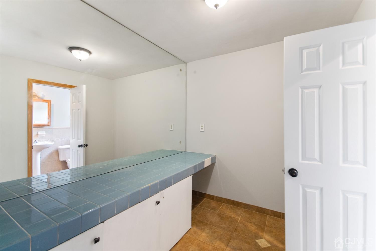 30 Wilk Road Edison, NJ 08837 - Photo 27 of 35 a room with a door