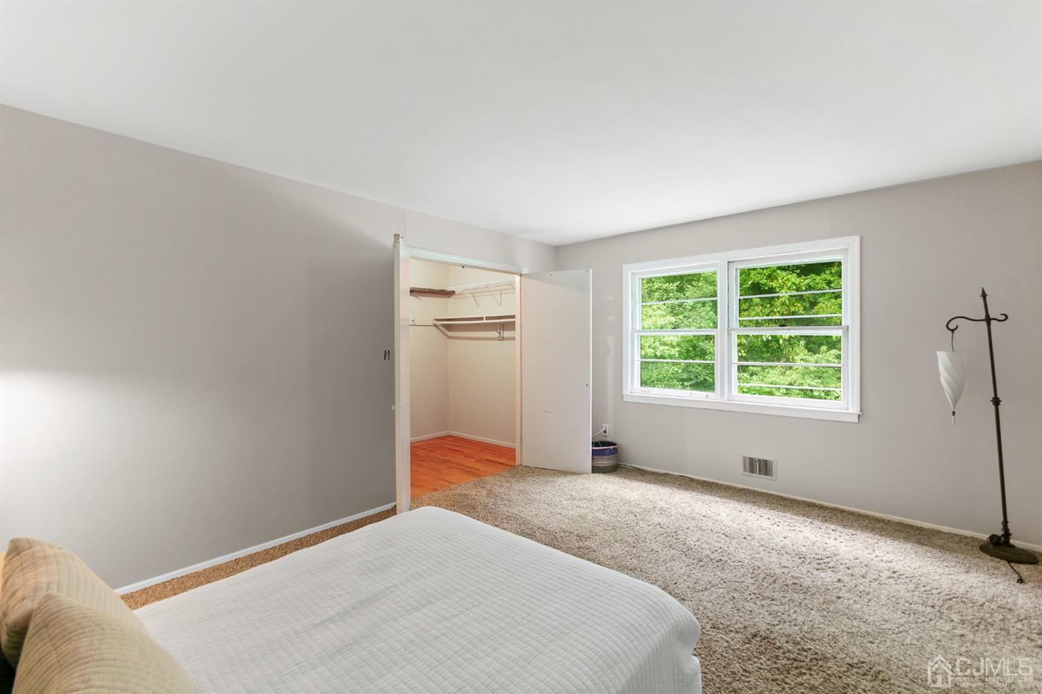 30 Wilk Road Edison, NJ 08837 - Photo 30 of 35 a bedroom with a bed and a window