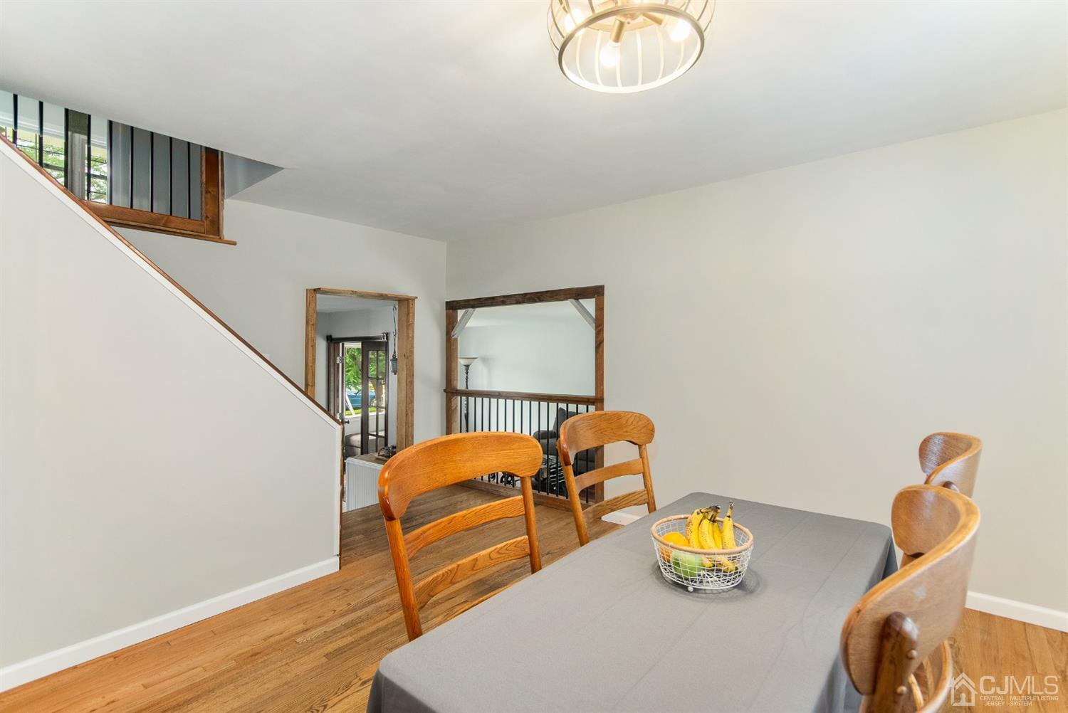 30 Wilk Road Edison, NJ 08837 - Photo 8 of 35 a living room with furniture and a wooden floor