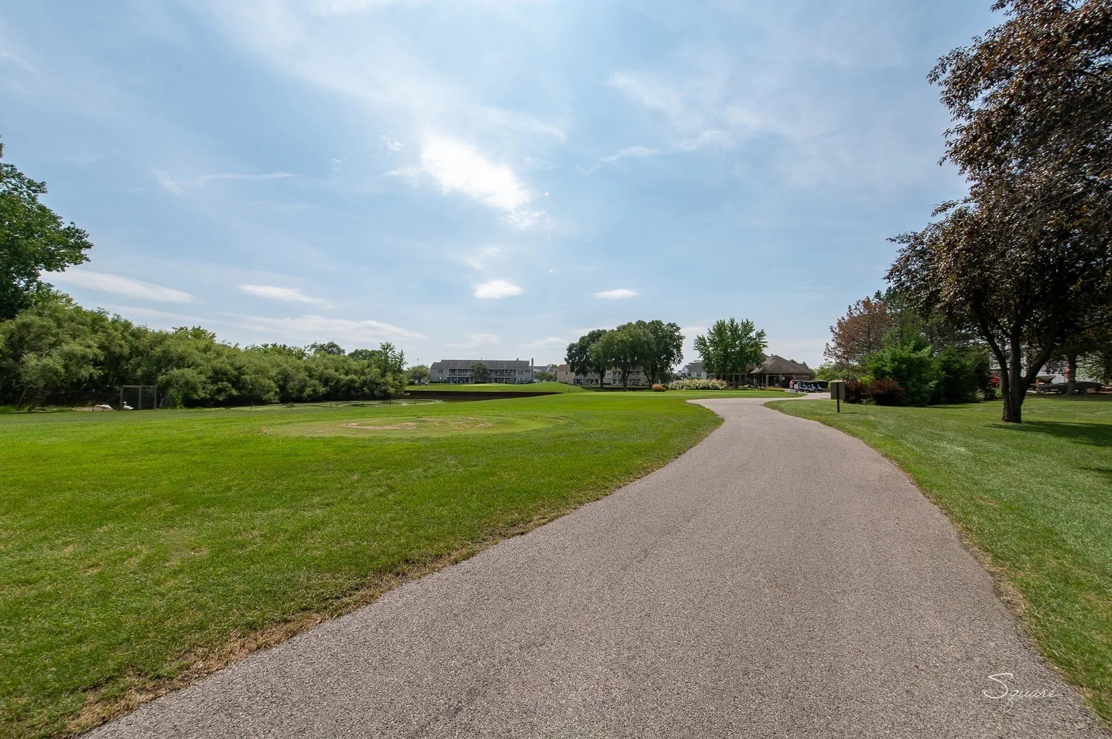 23 Taylor Court, Unit A Streamwood, IL 60107 - Photo 17 of 20 a view of building with outdoor space