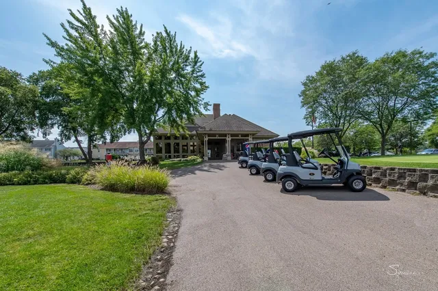 a view of street with parked cars