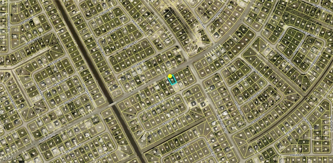 646 Alabama Road South Lehigh Acres, FL 33974 - Photo 2 of 5 view of a closet with wooden floor