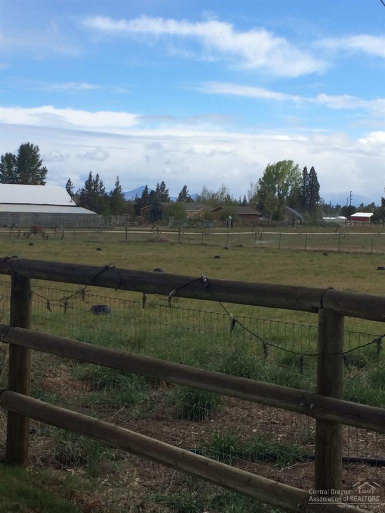 65520 Kentucky Road Bend, OR 97703 - Photo 7 of 25 a view of a lake with a big yard