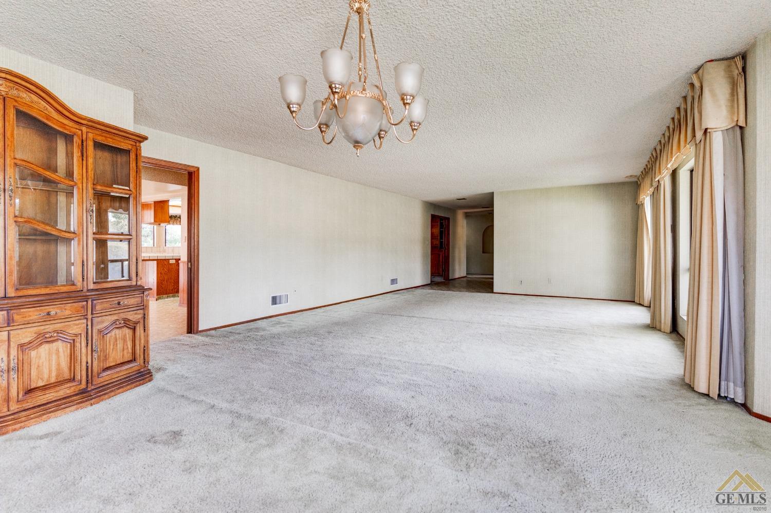 Undisclosed Address Bakersfield, CA 93309 - Photo 19 of 38 a view of an empty room with a window