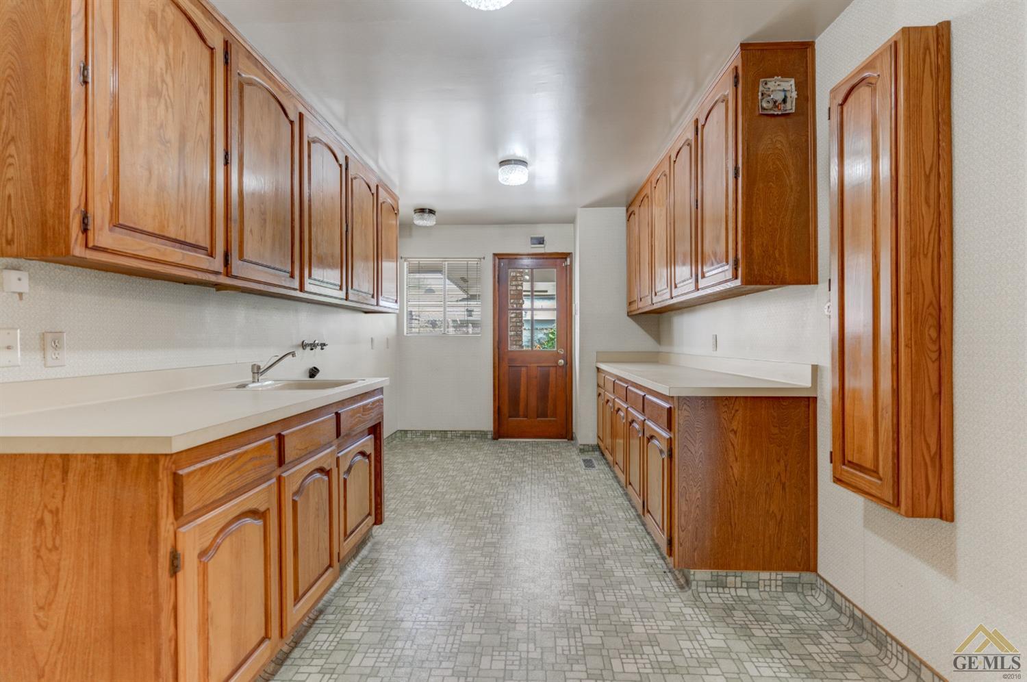 Undisclosed Address Bakersfield, CA 93309 - Photo 25 of 38 a kitchen with stainless steel appliances granite countertop a refrigerator and a sink