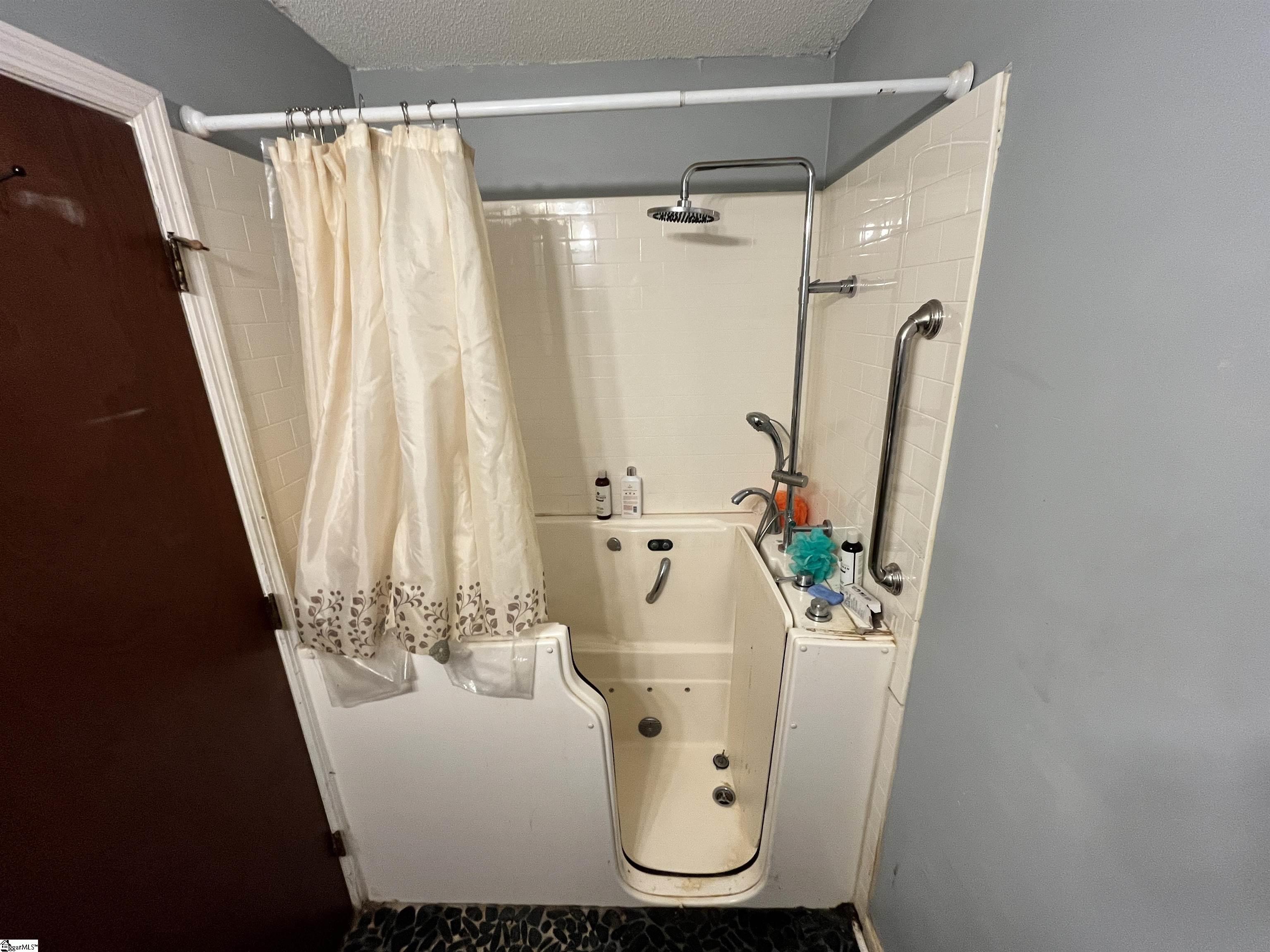 208 Baldwin Circle Clinton, SC 29325 - Photo 23 of 26 Walk in tub with jets