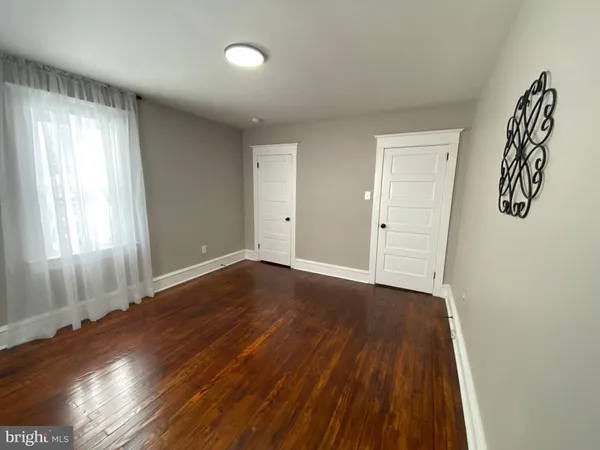 a kitchen with cabinets a sink and appliances