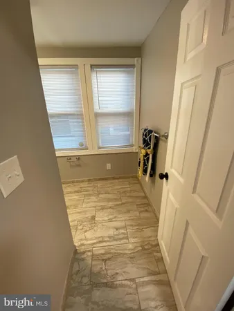 a bathroom with a bathtub and toilet