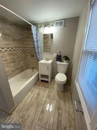 a view of a hallway with closet