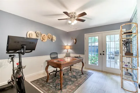 a workspace with furniture and wooden floor