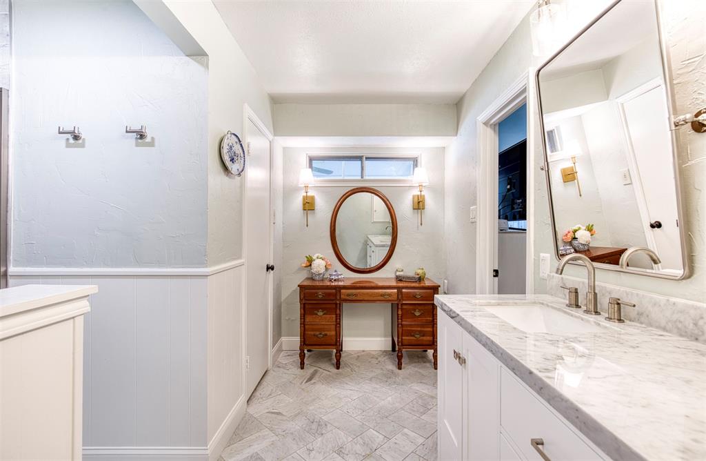 4829 Harvest Hill Dallas, TX 75244 - Photo 23 of 35 a bathroom with a granite countertop sink mirror and a
