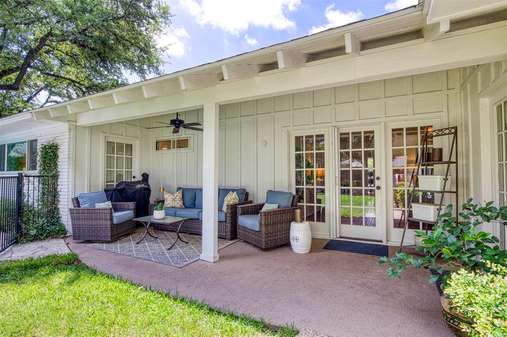 4829 Harvest Hill Dallas, TX 75244 - Photo 30 of 35 a view of a patio with couches table and chairs and potted plants