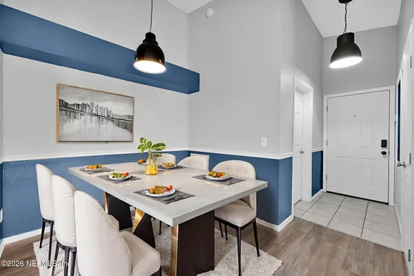 a view of a livingroom with wooden floor
