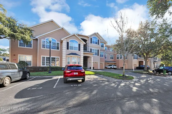 a car parked in front of a house