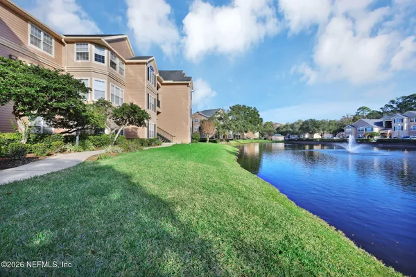 a view of a lake with a city