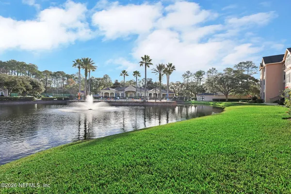 a view of swimming pool from a yard