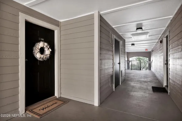 a view of a hallway with elevator