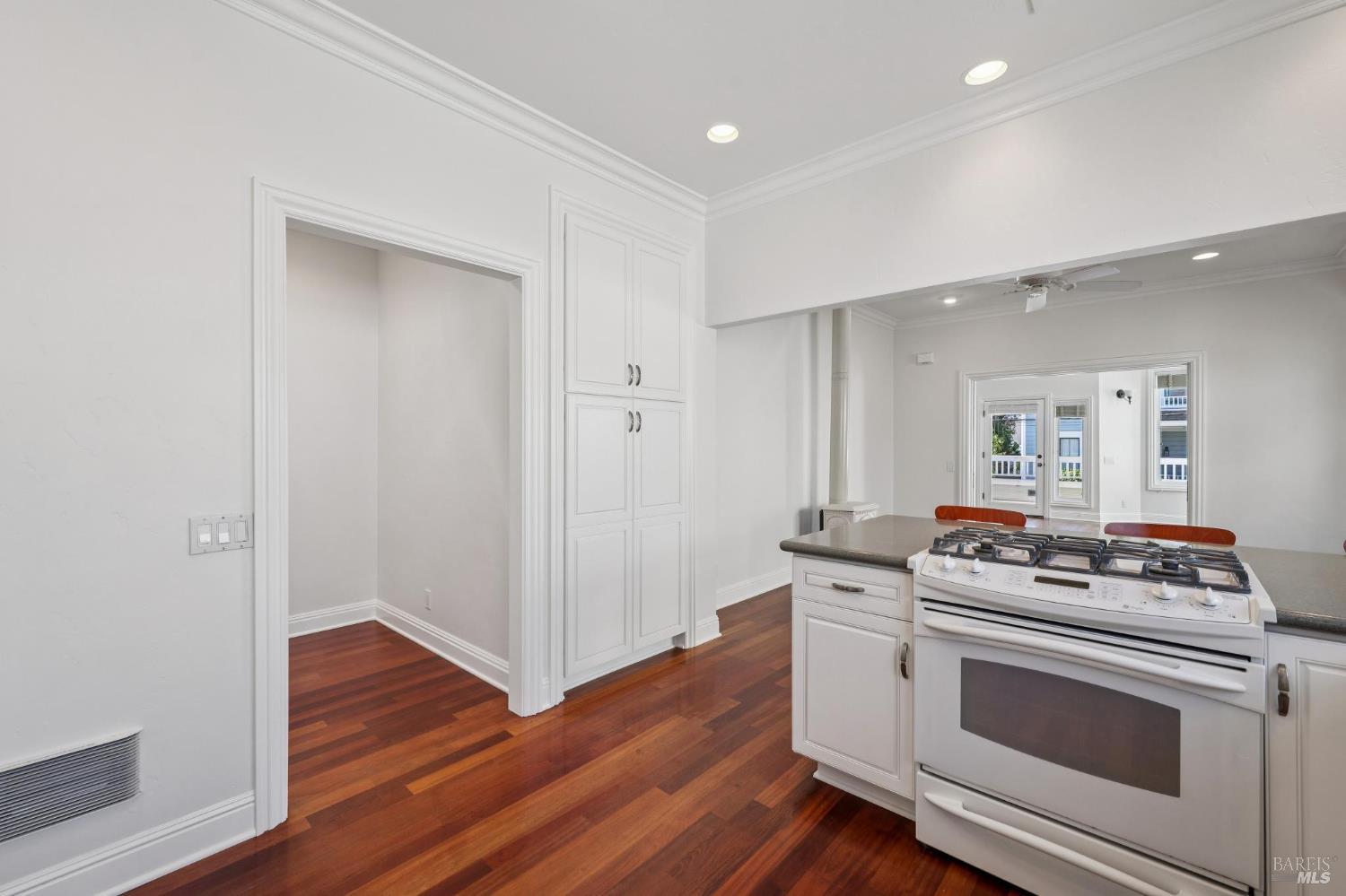 102 F Street San Rafael, CA 94901 - Photo 22 of 80 a kitchen with a stove and a wooden floor